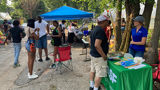 People walking around a street event